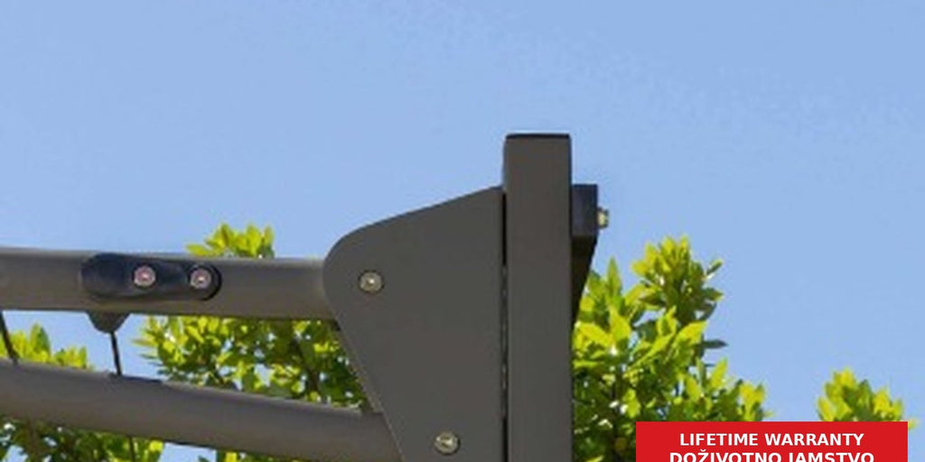 Hills Folding Frame Post Kit in Monument close-up of an upright post and mounting brackets beside a garden.