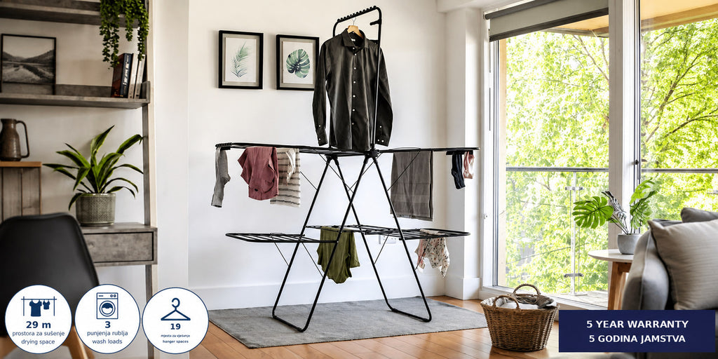 Hills Premium 2 Tier Garment Drying Rack in use with shirts, towels and garments hanging from its raised rail and drying levels.