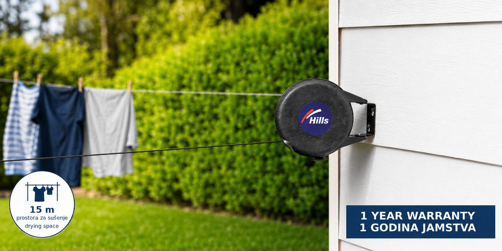 Hills Cordomatic Retractable Clothesline with 15 m drying line in black mounted on an exterior wall.
