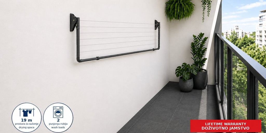 Hills Compact Folding Frame Clothesline – Monument folded flat against a balcony wall to save space.