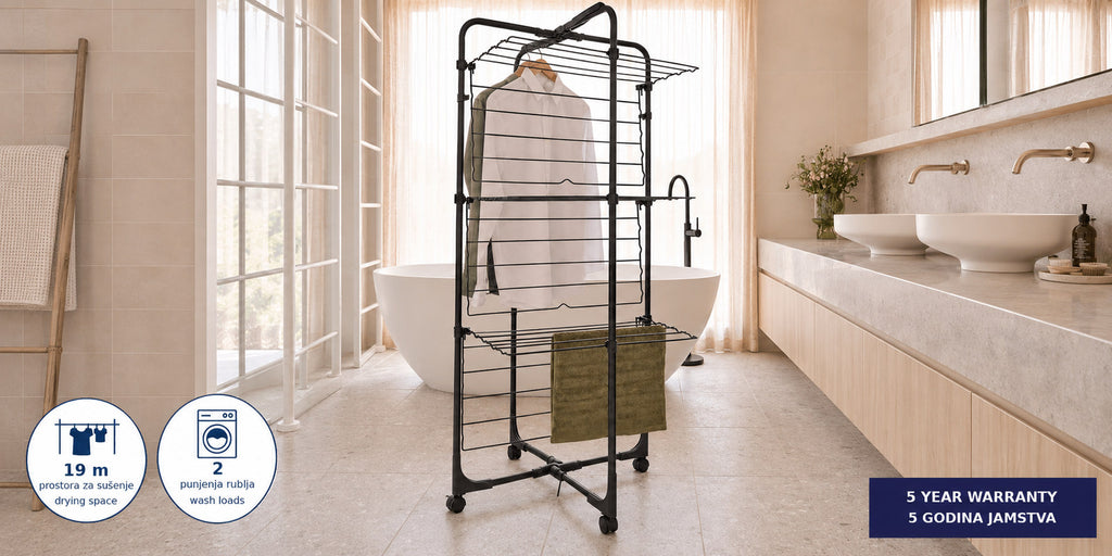 Hills Premium 3 Tier Mobile Drying Rack front view in a modern bathroom with garments on the rails.