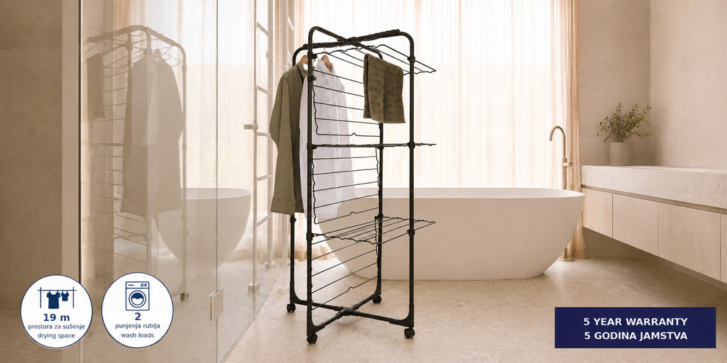 Hills Premium 3 Tier Mobile Drying Rack side view in a modern bathroom with garments on the rails.