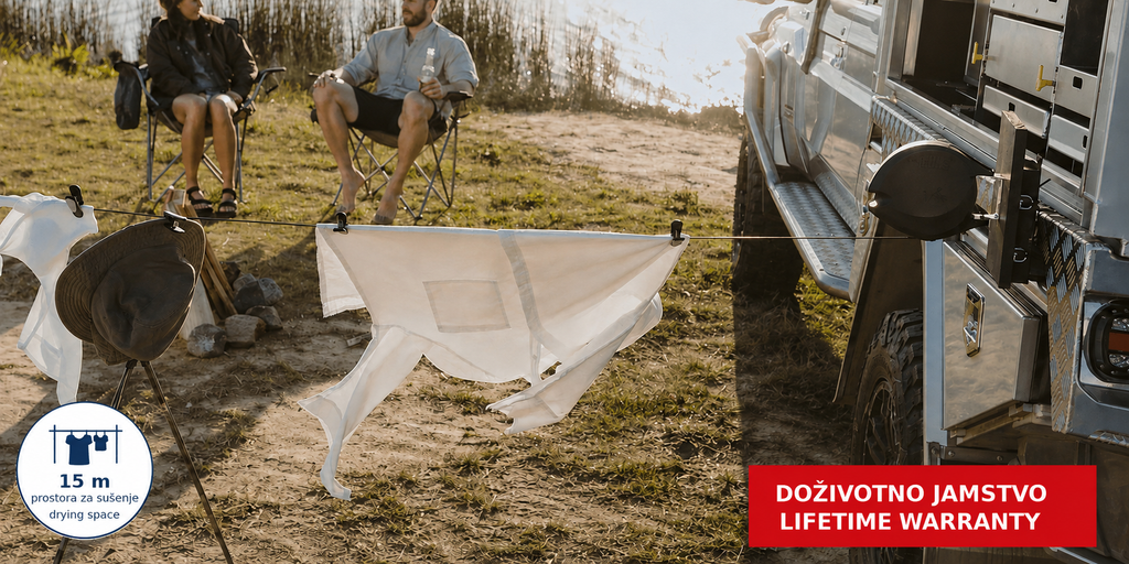 Hills Single Retractable Clothesline with 15 m drying line in use beside a camping vehicle.