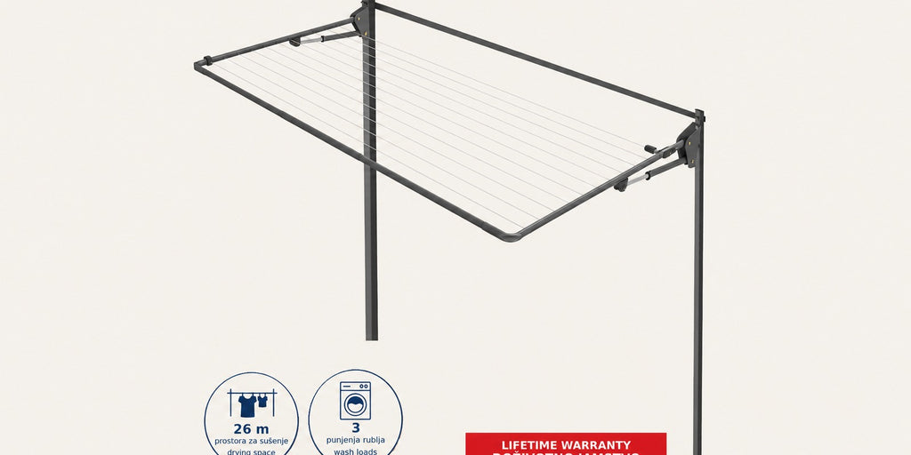 Hills Single Folding Frame Clothesline in Monument mounted on the optional freestanding post kit.