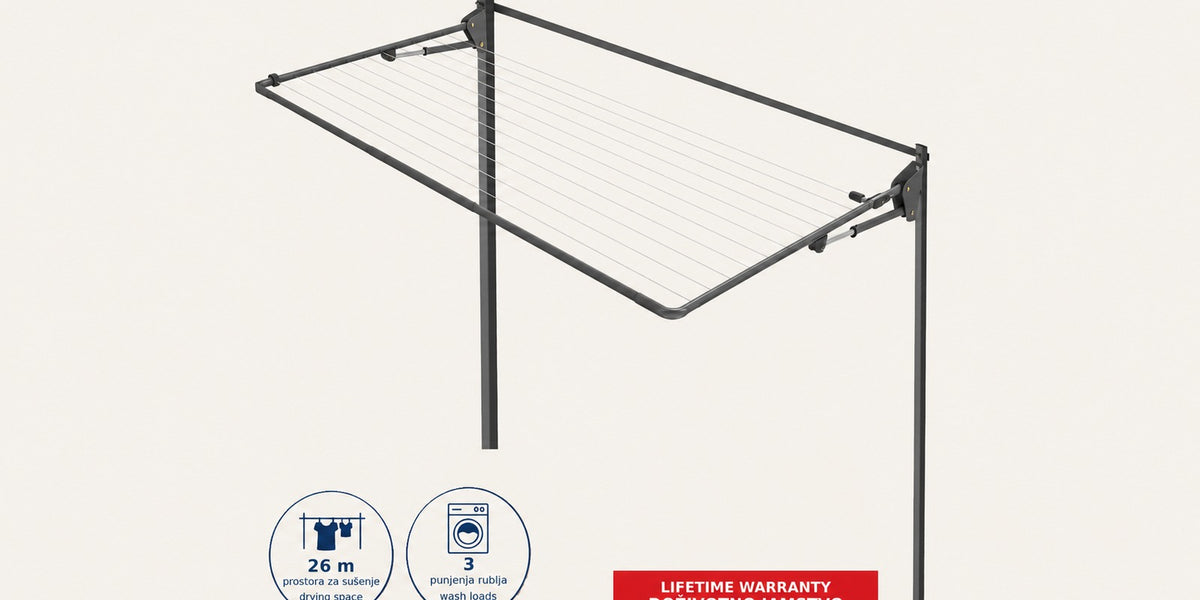 Hills Single Folding Frame Clothesline in Monument mounted on the optional freestanding post kit.