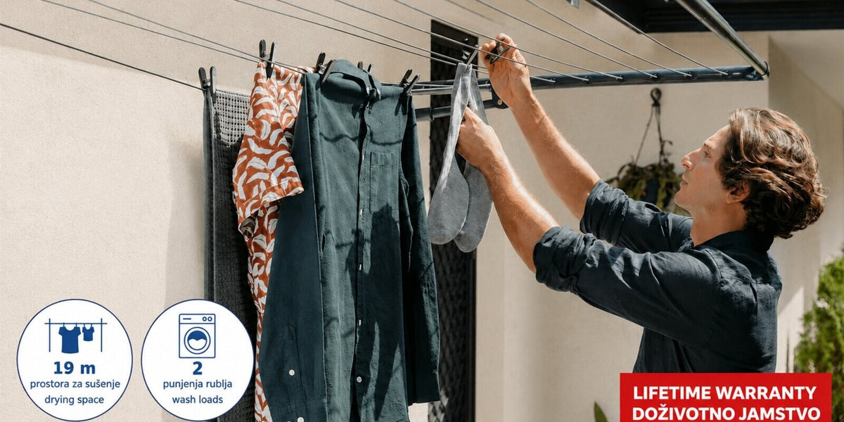 Hills Compact Folding Frame Clothesline – Monument shown from the front with laundry drying on the lines.